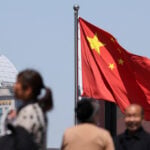 China's leaders pledge to support economy without big new stimulus plans