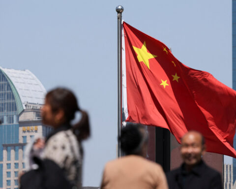China's leaders pledge to support economy without big new stimulus plans