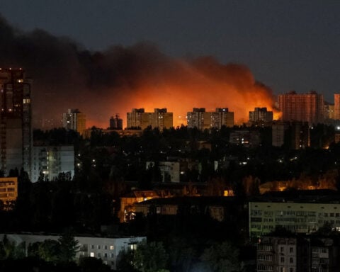 Russia says its big overnight strikes on Ukraine hit military factories and three ships