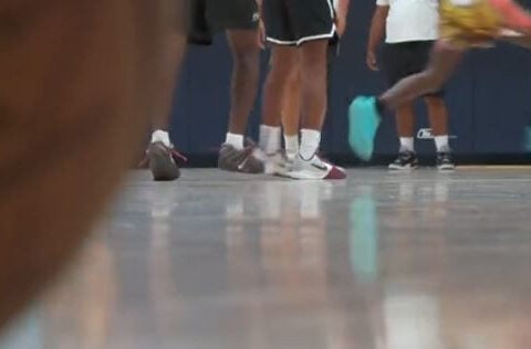 Police and kids building bonds with basketball: "We get to mold them"