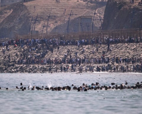 ‘Absolute chaos’ as thousands of people breach Morocco’s border with Spain's Ceuta