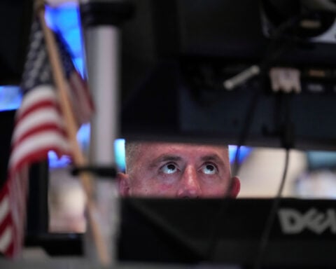 Microsoft leads a rally on Wall Street, while worries about inflation remain in the bond market