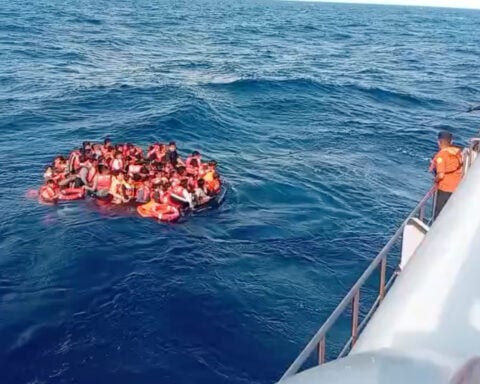 Indonesian rescuers evacuate dozens from a ferry fire that left at least 1 dead near Bali