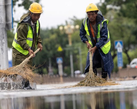 Rain pounds Beijing as Typhoon Dolphin sweeps through China