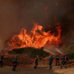 Wildfires, heatwaves pose growing fiscal risk to Greece, PM adviser says