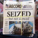 A Kansas town will pay $850K to end a reporter's lawsuit over a 2023 raid on her paper's offices