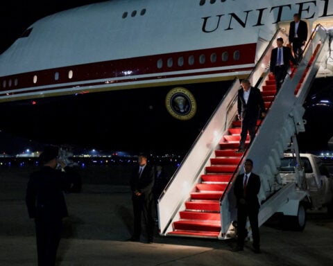 'If I go, you go, right?': Traveling on the presidential plane - without Trump