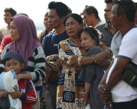 Rescuers evacuate more than 200 from a ferry fire that left at least 1 dead near Bali