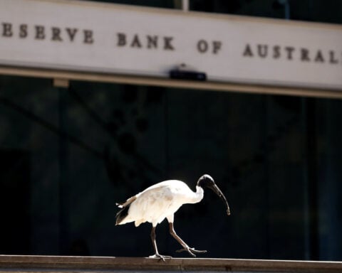 Australia central banker says rate hikes working as intended