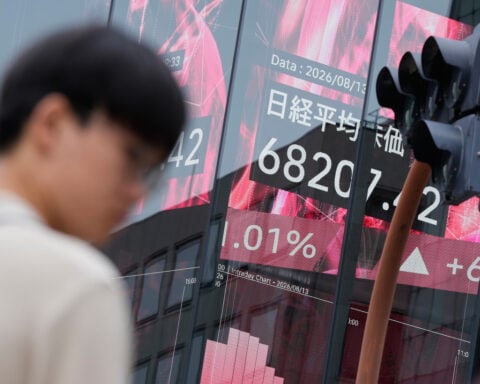 Asian shares mostly rise after AI leads rally on Wall Street