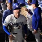 Dodgers' Freddie Freeman somehow avoids serious injury in frightening fall into visitors' dugout