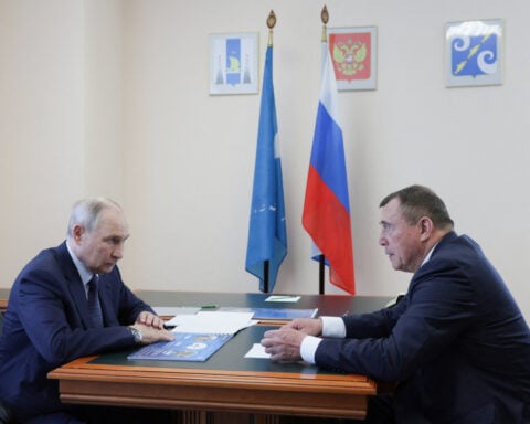Putin visits disputed island near Japan, drawing Tokyo's ire