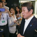 Putin's first trip to the Pacific island chain claimed by Japan draws a protest from Tokyo