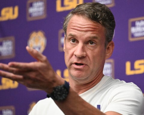 Lane Kiffin stands by D.J. Pickett wearing the No. 5 of former LSU QB Jayden Daniels
