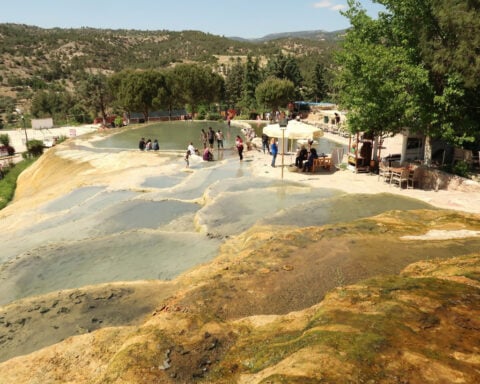 The magical white stone wonderland with effervescent bathing pools