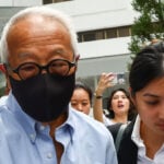Singapore property tycoon linked to jailed minister pleads guilty