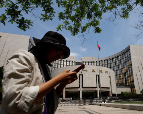 China leaves benchmark lending rates unchanged, as expected
