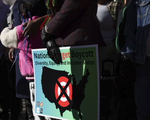 Which US companies are pulling back on diversity initiatives?