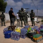 Palestinians besieged in West Bank village fear Israeli settlers will seize their homes
