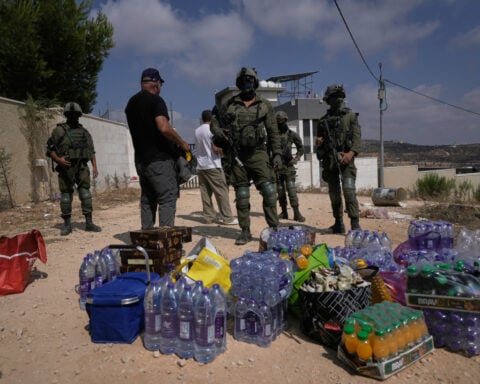 Palestinians besieged in West Bank village fear Israeli settlers will seize their homes