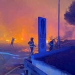 Wildfire descends on Croatian tourist town, injures 36
