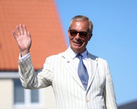 Nigel Farage regains UK parliamentary seat, fights off Count Binface challenge