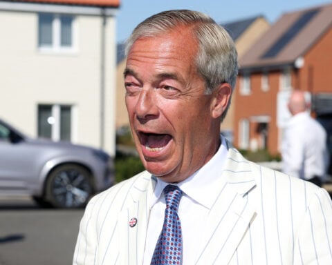 Reform UK's Nigel Farage beats a slate of fringe candidates in election boycotted by major parties