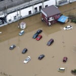 Japan's record rains strand thousands at Narita airport; kill eight