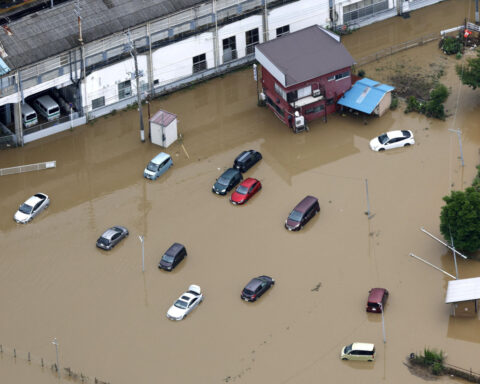 Japan's record rains strand thousands at Narita airport; kill eight