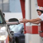 Pull up to the window, please, for a glimpse of an American icon: The drive-thru