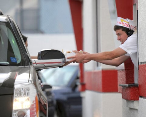 Pull up to the window, please, for a glimpse of an American icon: The drive-thru
