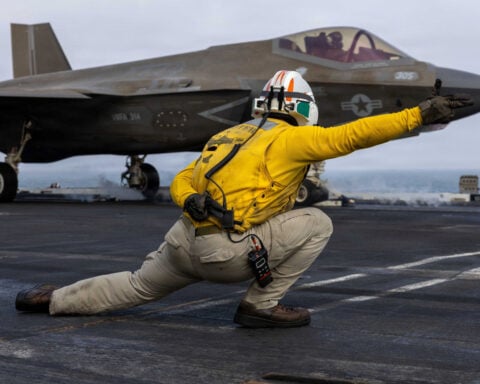 Sailors on carriers like the USS Abraham Lincoln feel the strain as Navy deployments stretch longer