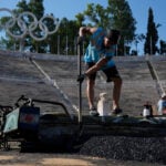 Athens is cleaning its all-marble Olympic stadium for the first time in more than a century