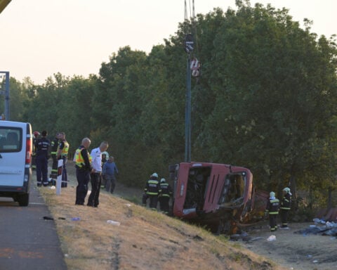 A bus crash in Hungary kills 12 people, injures at least 10 others