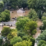 At least 6 people have died from days of storms and record-setting flooding in Indiana