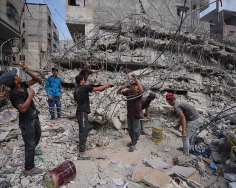 Top US commander visits aircraft carrier, Gaza talks in Egypt and other Mideast news