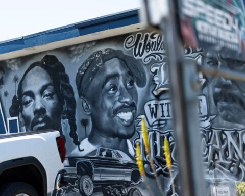 Los Angeles gang leader masterminded Tupac's drive-by killing, prosecutor tells jury