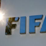 Soccer-Senior FIFA official Lamour exits after Infantino criticism