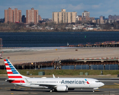 American Airlines to restore seatback screens, add premium seats in profit push