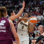 Mitchell scores 29 points before sitting out 4th and Clark adds 24 as Fever beat Tempo 101-95