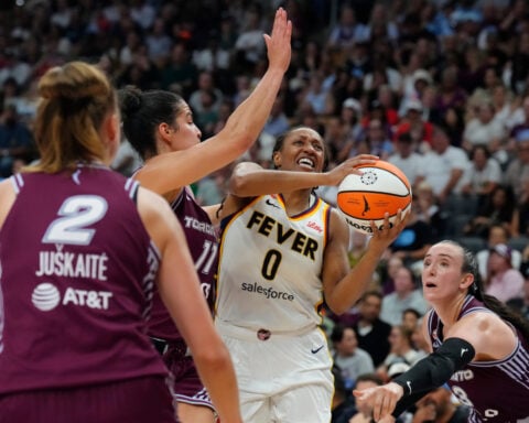 Mitchell scores 29 points before sitting out 4th and Clark adds 24 as Fever beat Tempo 101-95