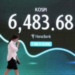 Shares fall in Asia, with Kospi down 5.2%, while oil prices jump