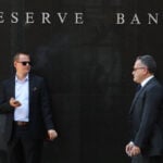 RBA's Hauser warns of rate hike if inflation risks crystallize