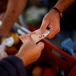 Euro zone current account surplus widens in June