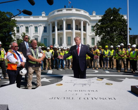 Trump plays White House tour guide to show off work on his helipad and ballroom