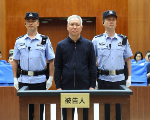 Chinese court sentences founder of troubled property developer Evergrande to life in prison