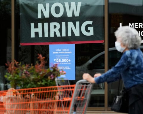 US unemployment claims dropped to 206,000 last week with layoffs still sparse