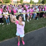Women in pink rally in support of Lindsay Clancy who is on trial for killing 3 children