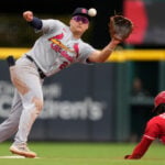 Dane Myers' dropped fly with 2 outs in 9th gives Cardinals a wild 10-9 win over Reds