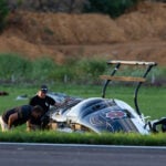 Investigators probe a dramatic midair crash as a landing plane hits hovering police helicopter